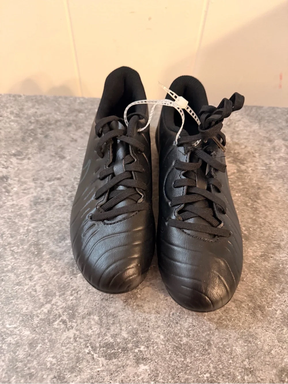 Nike Kids Black Soccer Cleats with Subtle Dark Swoosh